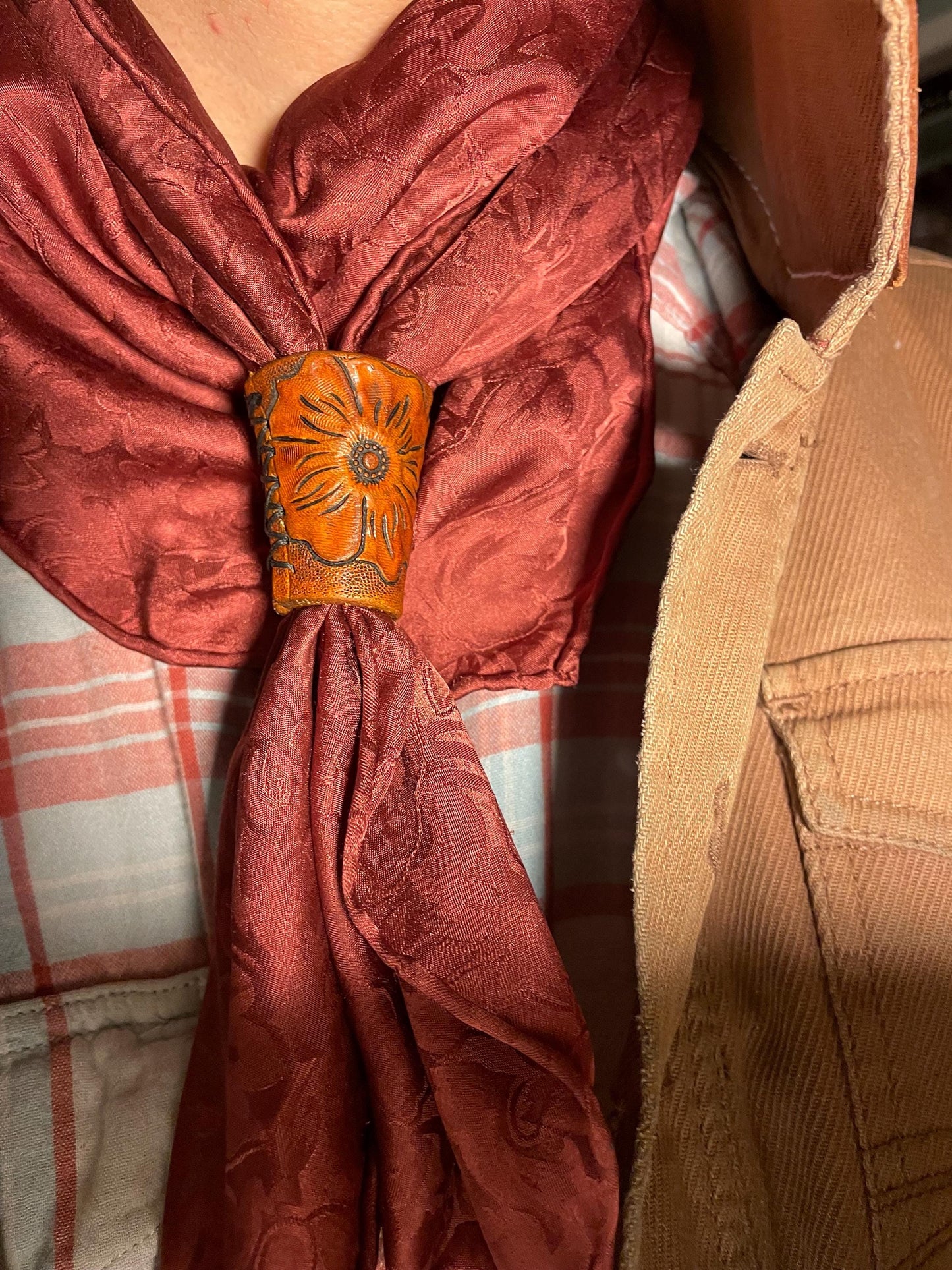 Wild rag tie, hand tooled